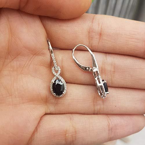 Dazzlingrock Collection 10K Oval Blue Sapphire & Round White Diamond Ladies Infinity Dangling Earrings, White Gold