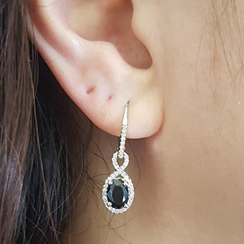 Dazzlingrock Collection 10K Oval Blue Sapphire & Round White Diamond Ladies Infinity Dangling Earrings, White Gold